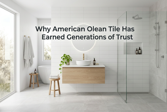 Modern white bathroom with American Olean tile. Text: Why American Olean Tile Has Earned Generations of Trust.