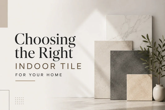 Modern indoor tile display featuring marble, stone, and neutral-toned tile samples arranged in a contemporary interior setting