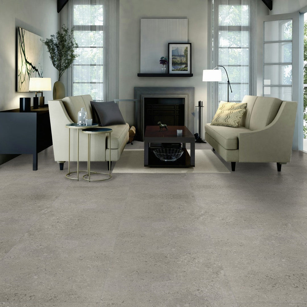 Daltile Dignitary large format matte porcelain floor tile in an open-plan kitchen and living space