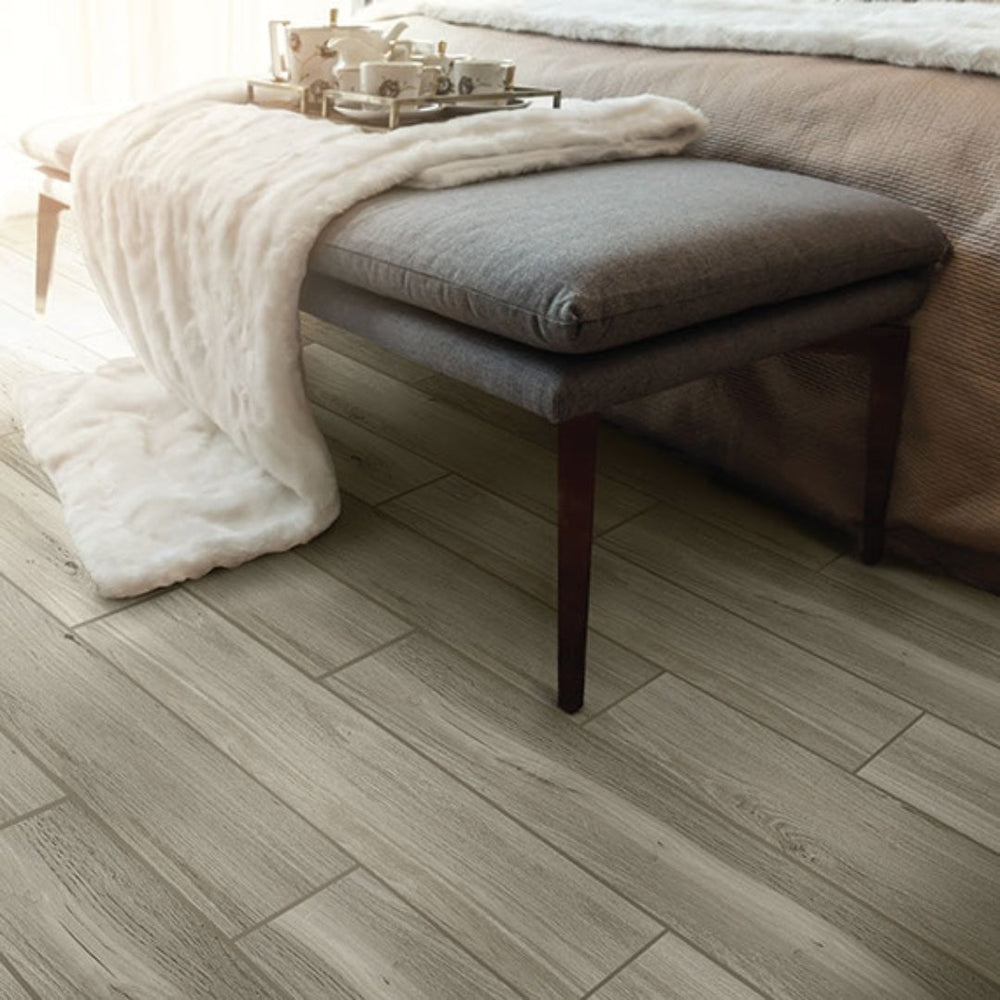 Daltile RevoTile — a matte porcelain wood-look plank in over a dozen colorways, in stock and ready to ship.